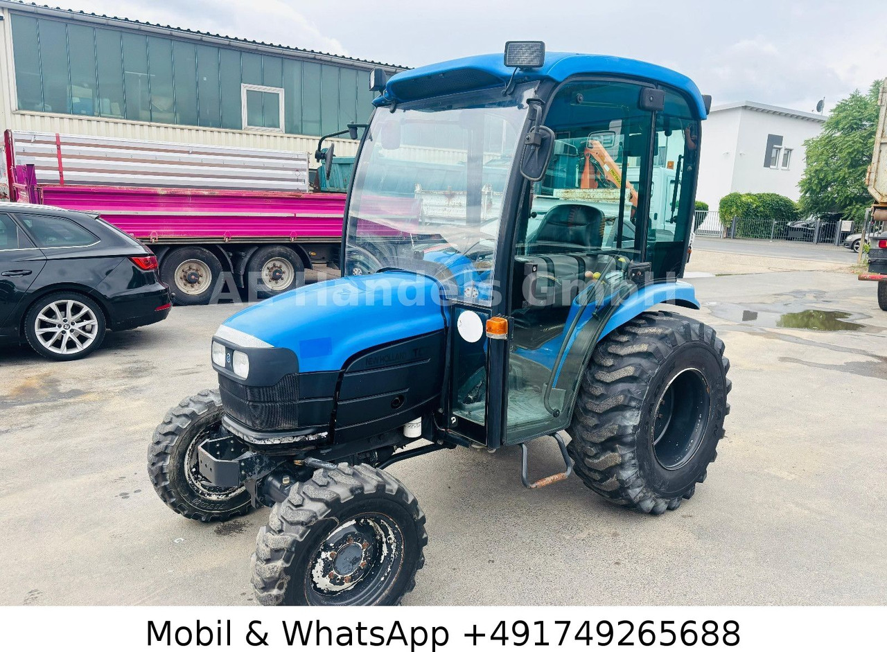 New Holland TC22D Compact Tractor *1500Std./StraßenZulassung - Tractor agricol: Foto 1 New Holland TC22D Compact Tractor *1500Std./StraßenZulassung - Tractor agricol: Foto 1