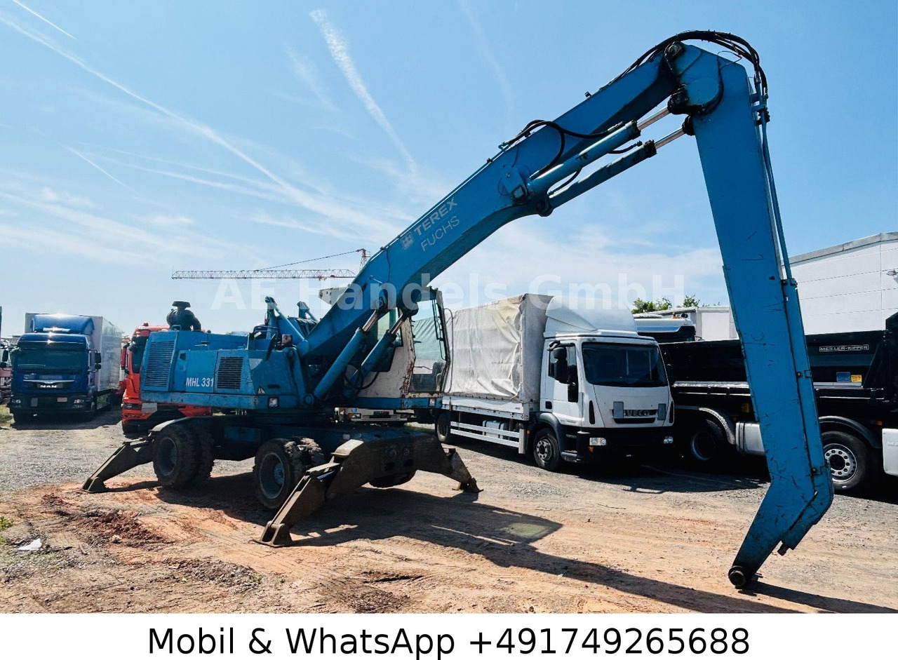 Terex MHL 331 Umschlagbagger - Excavator pe roţi: Foto 1 Terex MHL 331 Umschlagbagger - Excavator pe roţi: Foto 1