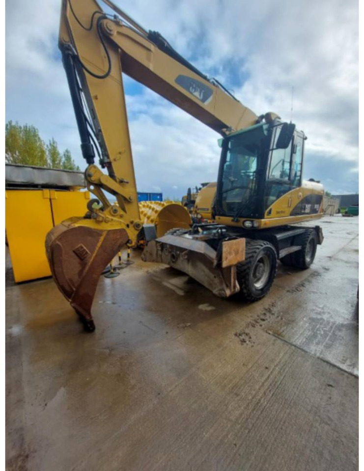 CAT M315D - Excavator pe roţi: Foto 1 CAT M315D - Excavator pe roţi: Foto 1