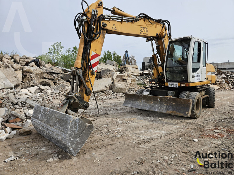 Liebherr A 316 Litronic - Excavator pe roţi: Foto 1 Liebherr A 316 Litronic - Excavator pe roţi: Foto 1