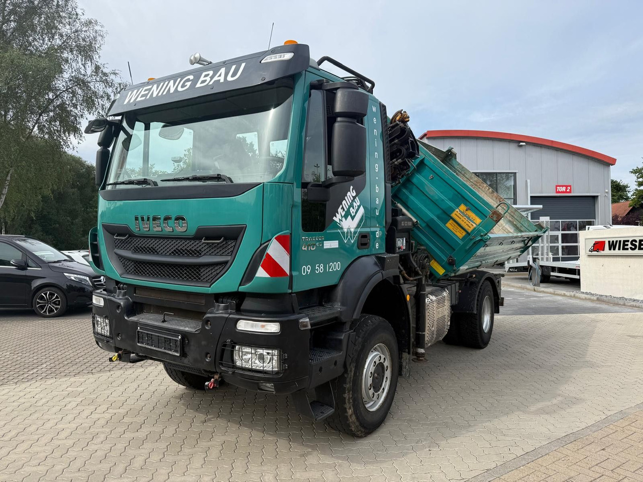 Iveco AD190 T/W Trakker 410 4x4 Allrad Kran KipperHIAB - Camion basculantă, Camion cu macara: Foto 1 Iveco AD190 T/W Trakker 410 4x4 Allrad Kran KipperHIAB - Camion basculantă, Camion cu macara: Foto 1