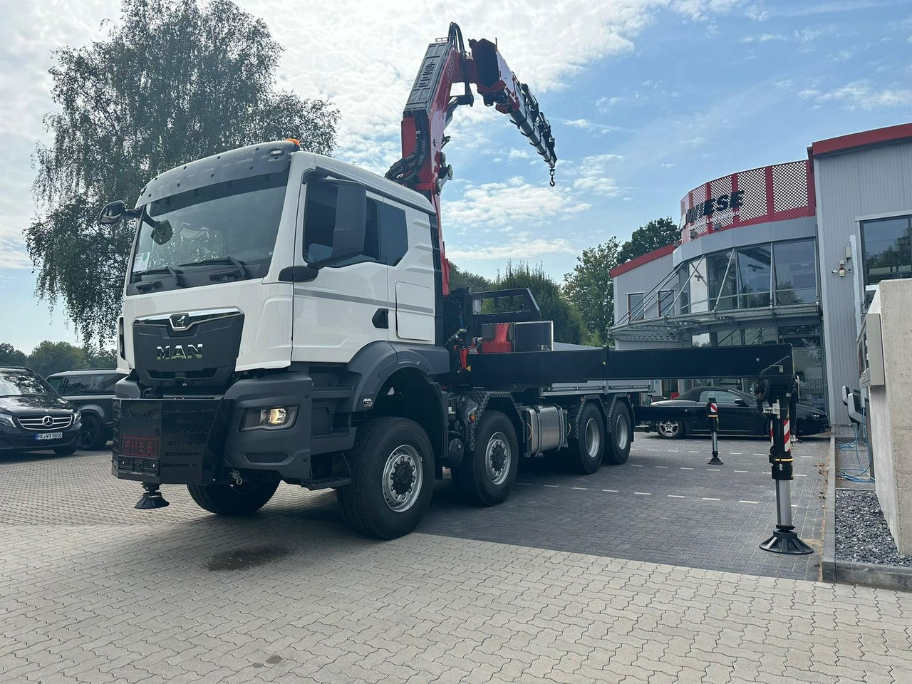 MAN TGS 41.520 8x8 mit Fassi Ladekran F710RA.2.26 - Camion platformă: Foto 2 MAN TGS 41.520 8x8 mit Fassi Ladekran F710RA.2.26 - Camion platformă: Foto 2
