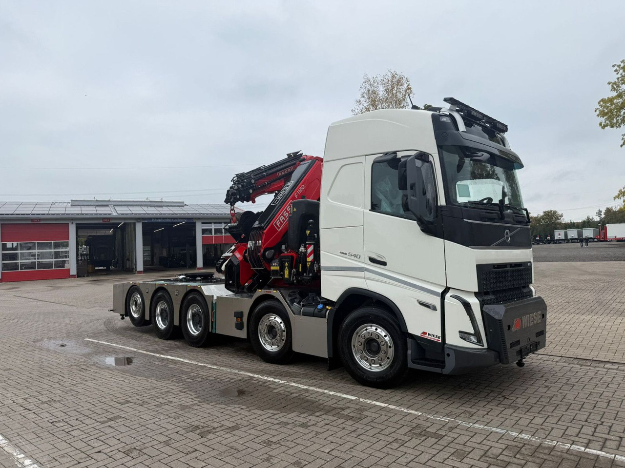 Volvo FH540 10x4 mit F1150 Ladekran, Sattelzugmaschine - Camion platformă, Camion cu macara: Foto 1 Volvo FH540 10x4 mit F1150 Ladekran, Sattelzugmaschine - Camion platformă, Camion cu macara: Foto 1