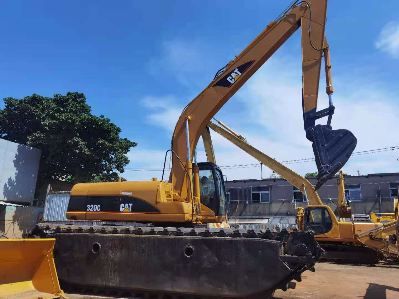 CATERPILLAR 320C - Excavator plutitoare: Foto 1 CATERPILLAR 320C - Excavator plutitoare: Foto 1