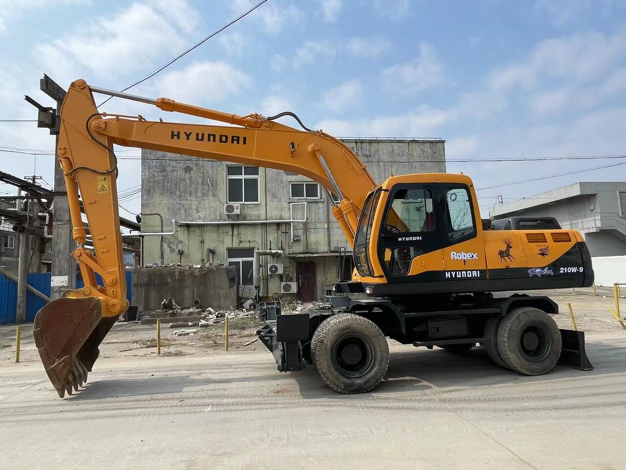 HYUNDAI 210W-9 - Excavator pe roţi: Foto 1 HYUNDAI 210W-9 - Excavator pe roţi: Foto 1