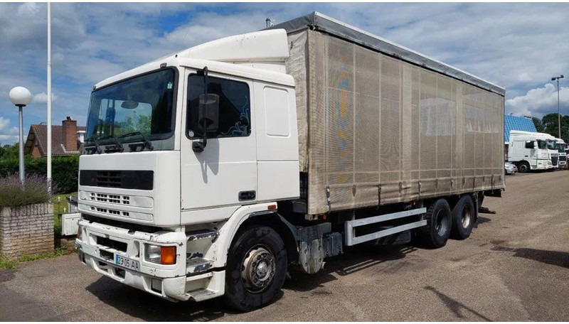 DAF 95.360 360 MANUAL GEARBOX 10 tyres - Camion cu prelată: Foto 1 DAF 95.360 360 MANUAL GEARBOX 10 tyres - Camion cu prelată: Foto 1