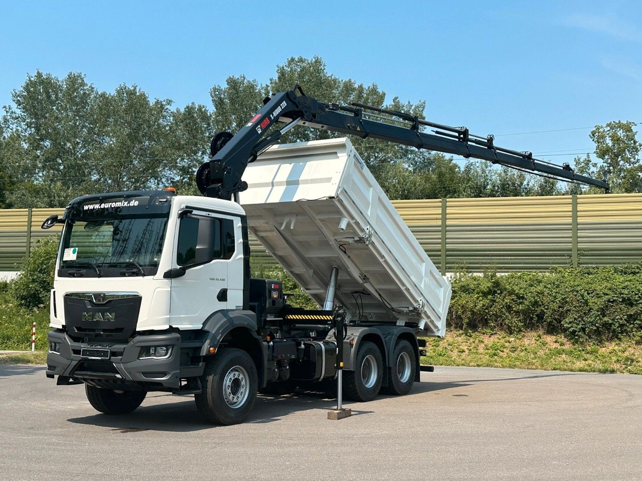 MAN TGS 33.440 6x4 /3-Seiten- Kipper / HIAB 228-6 - Camion basculantă, Camion cu macara: Foto 1 MAN TGS 33.440 6x4 /3-Seiten- Kipper / HIAB 228-6 - Camion basculantă, Camion cu macara: Foto 1