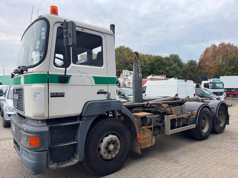MAN 33.403 **BELGIAN TRUCK-FULL STEEL-MANUAL PUMP** - Camion cu cârlig: Foto 1 MAN 33.403 **BELGIAN TRUCK-FULL STEEL-MANUAL PUMP** - Camion cu cârlig: Foto 1