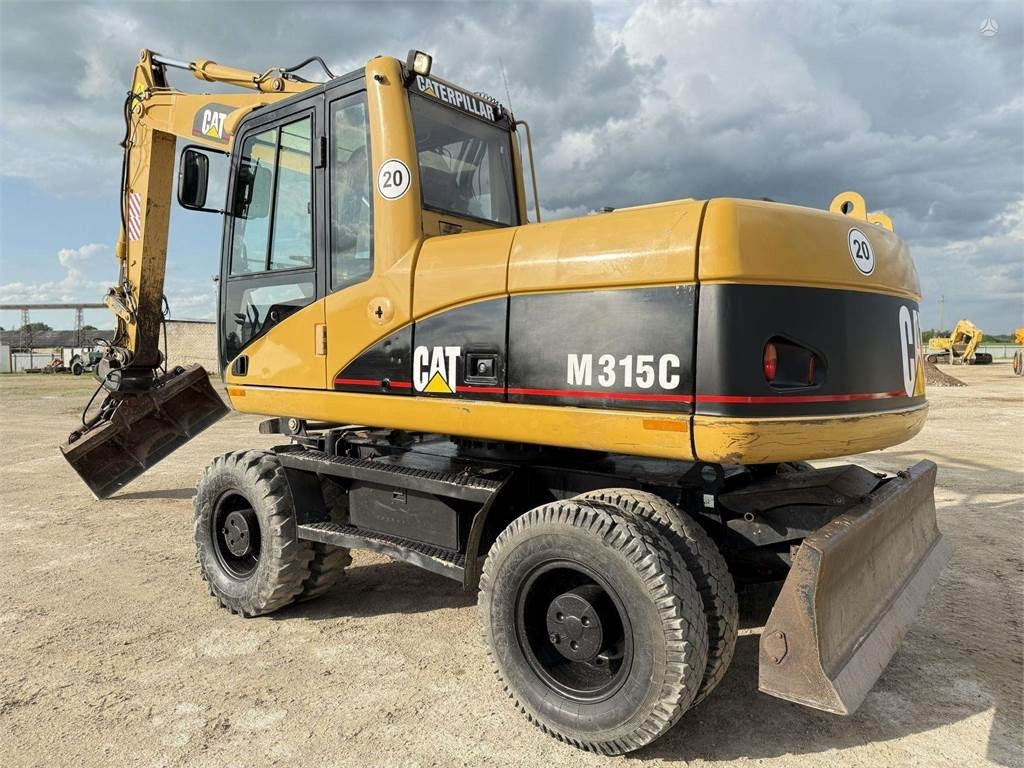 CAT M315C - Excavator pe roţi: Foto 1 CAT M315C - Excavator pe roţi: Foto 1