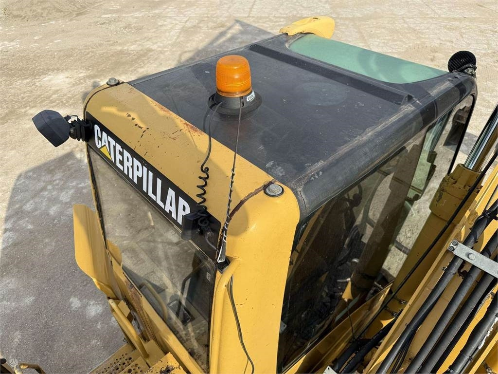 Excavator pe roţi CAT M315C: Foto 19