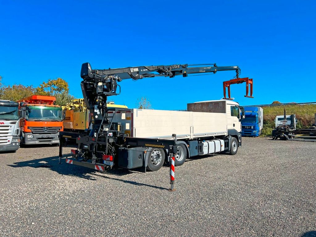 MAN 26.480 6X2 Baustoff mit Kran HIAB Top Zustand MAN 26.480 6X2 Baustoff mit Kran HIAB Top Zustand - Camion cu macara, Camion platformă: Foto 1 MAN 26.480 6X2 Baustoff mit Kran HIAB Top Zustand MAN 26.480 6X2 Baustoff mit Kran HIAB Top Zustand - Camion cu macara, Camion platformă: Foto 1