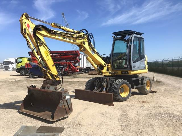 New Holland MH2.6 - Excavator pe roţi: Foto 1 New Holland MH2.6 - Excavator pe roţi: Foto 1