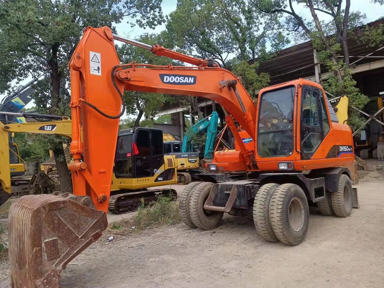 Doosan DH150W - Excavator pe roţi: Foto 2 Doosan DH150W - Excavator pe roţi: Foto 2