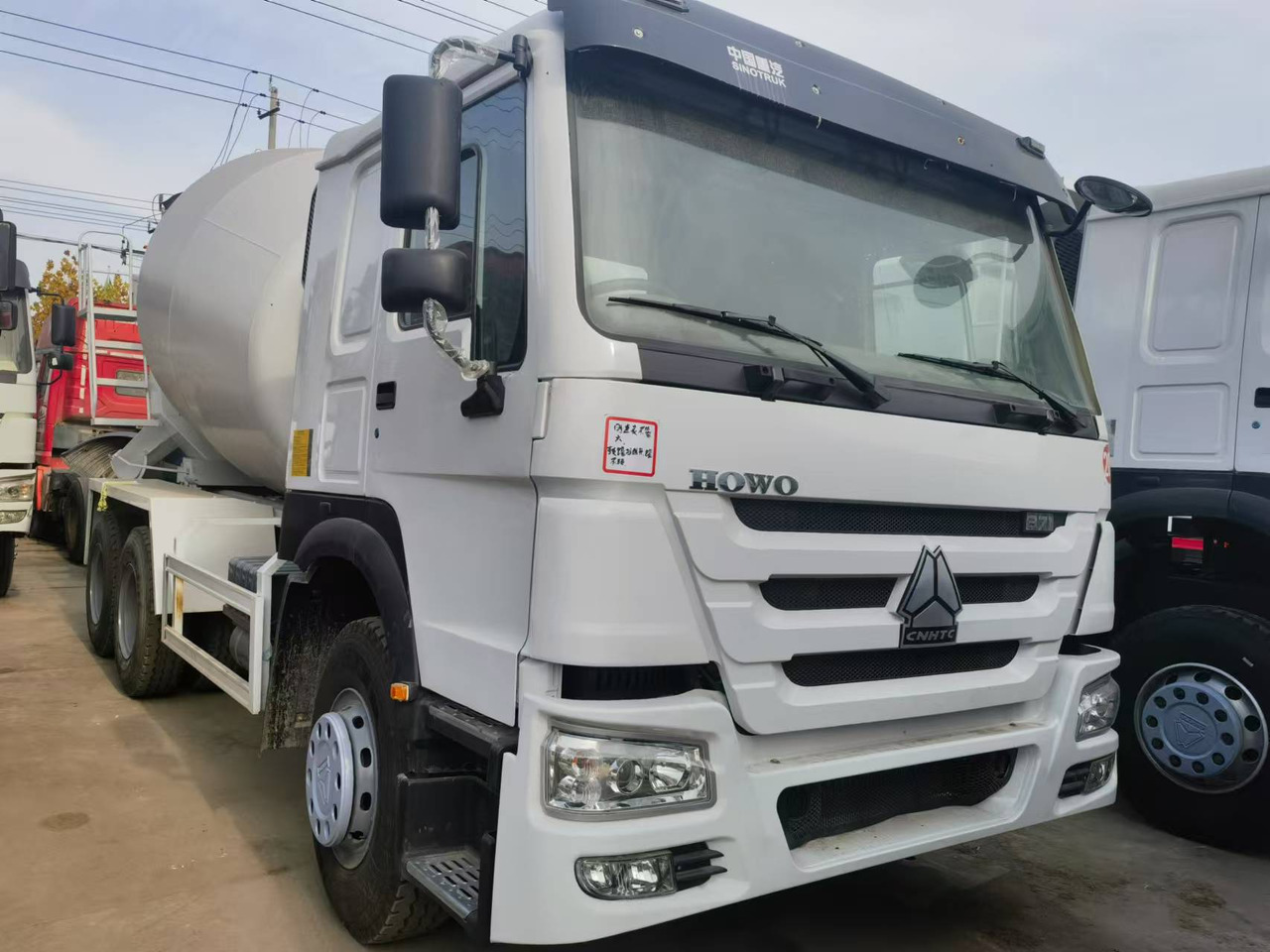 Sinotruk HOWO 371 Concrete mixer truck - Autobetonieră: Foto 1 Sinotruk HOWO 371 Concrete mixer truck - Autobetonieră: Foto 1