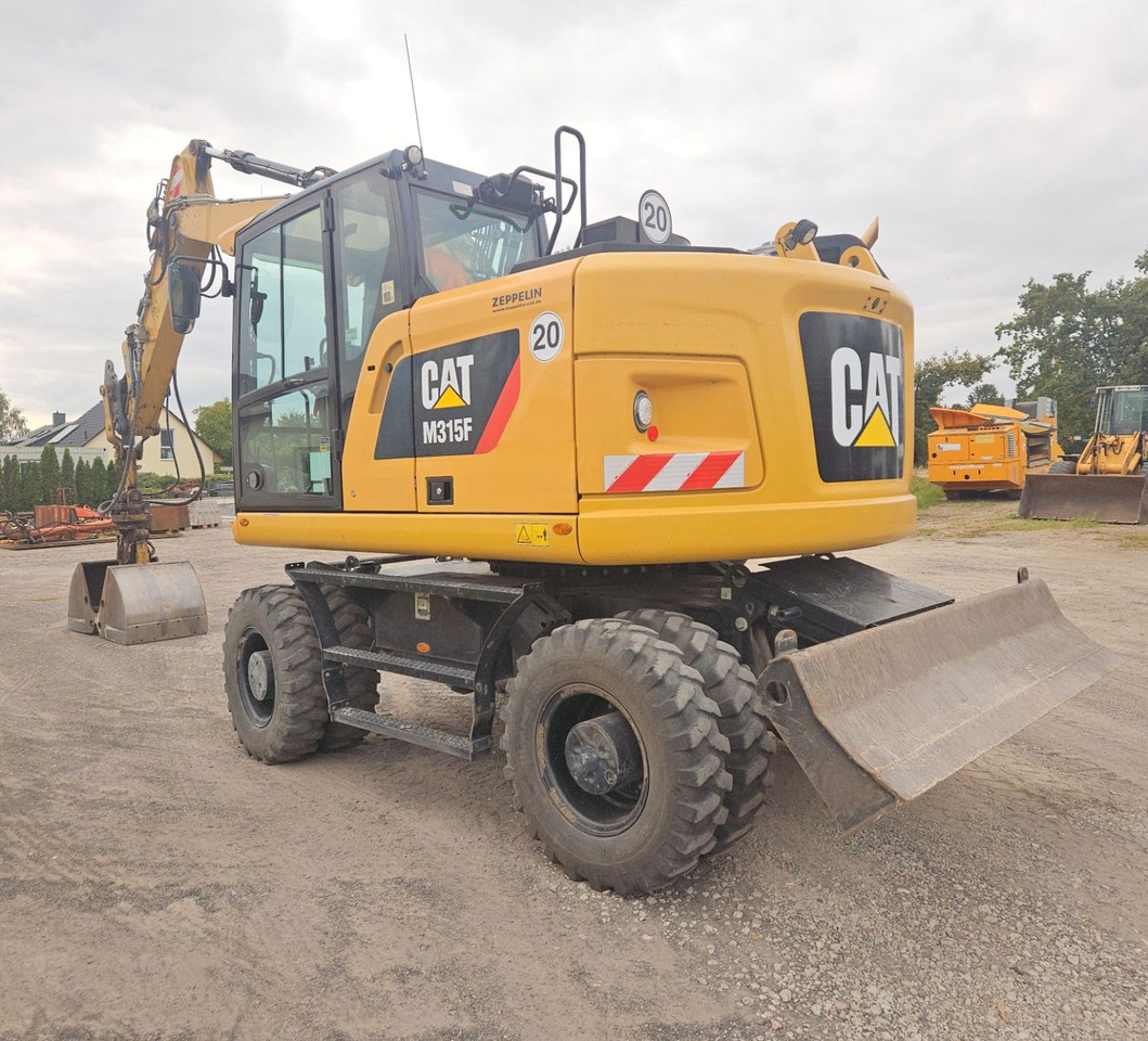 CAT M315F, orig. 2.828h - Excavator pe roţi: Foto 2 CAT M315F, orig. 2.828h - Excavator pe roţi: Foto 2