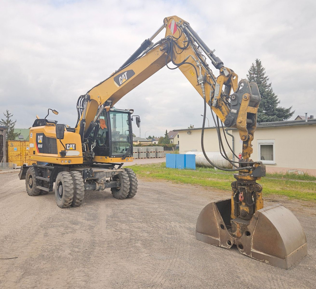 CAT M315F, orig. 2.828h - Excavator pe roţi: Foto 1 CAT M315F, orig. 2.828h - Excavator pe roţi: Foto 1
