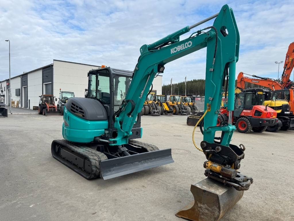 Mini excavator Kobelco SK45SRX-6 Pyörittäjä pihdeillä: Foto 6 Mini excavator Kobelco SK45SRX-6 Pyörittäjä pihdeillä: Foto 6