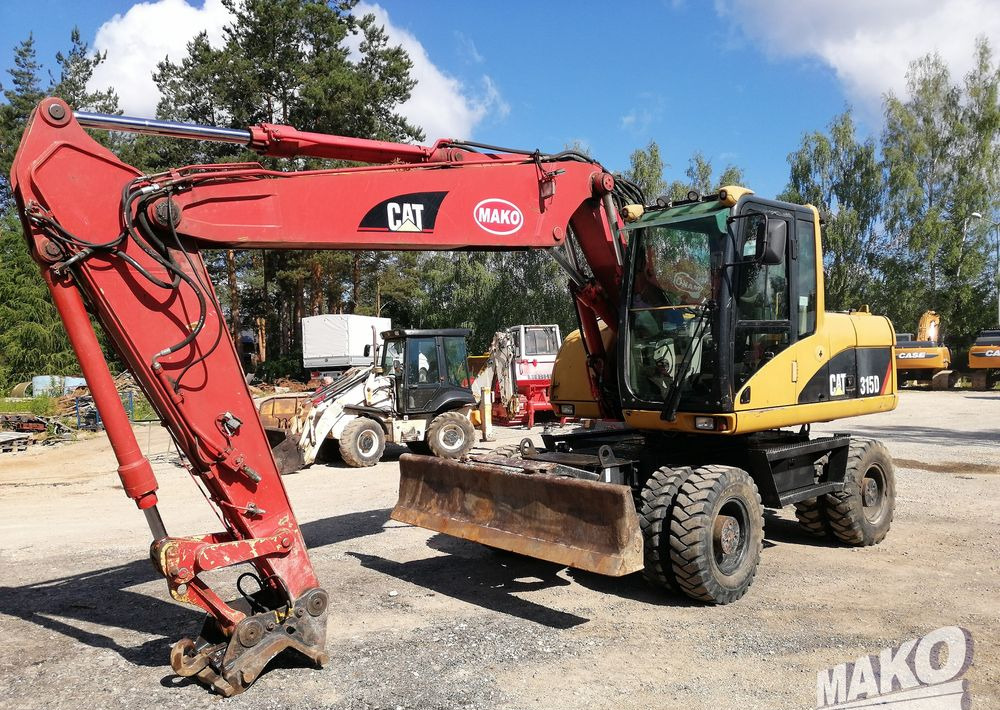 Caterpillar M315 C - Excavator pe roţi: Foto 1 Caterpillar M315 C - Excavator pe roţi: Foto 1