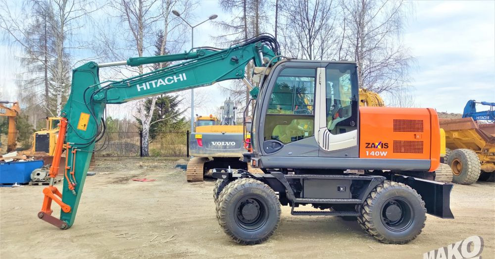 Hitachi ZX140W-3 - Excavator pe roţi: Foto 1 Hitachi ZX140W-3 - Excavator pe roţi: Foto 1