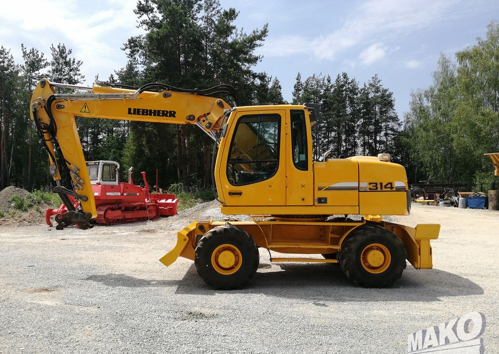 Liebherr A 314 Litronic - Excavator pe roţi: Foto 2 Liebherr A 314 Litronic - Excavator pe roţi: Foto 2