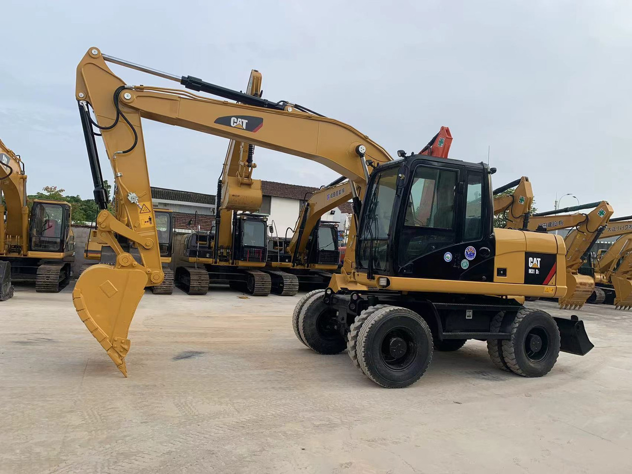 Caterpillar M315D Wheel Excavator Moving by Tires - Excavator pe roţi: Foto 2 Caterpillar M315D Wheel Excavator Moving by Tires - Excavator pe roţi: Foto 2