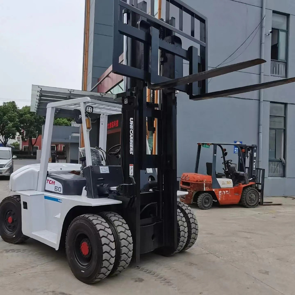 TCM 6 ton Diesel Forklift FD60 with Fork Positioner - Stivuitor diesel: Foto 3 TCM 6 ton Diesel Forklift FD60 with Fork Positioner - Stivuitor diesel: Foto 3