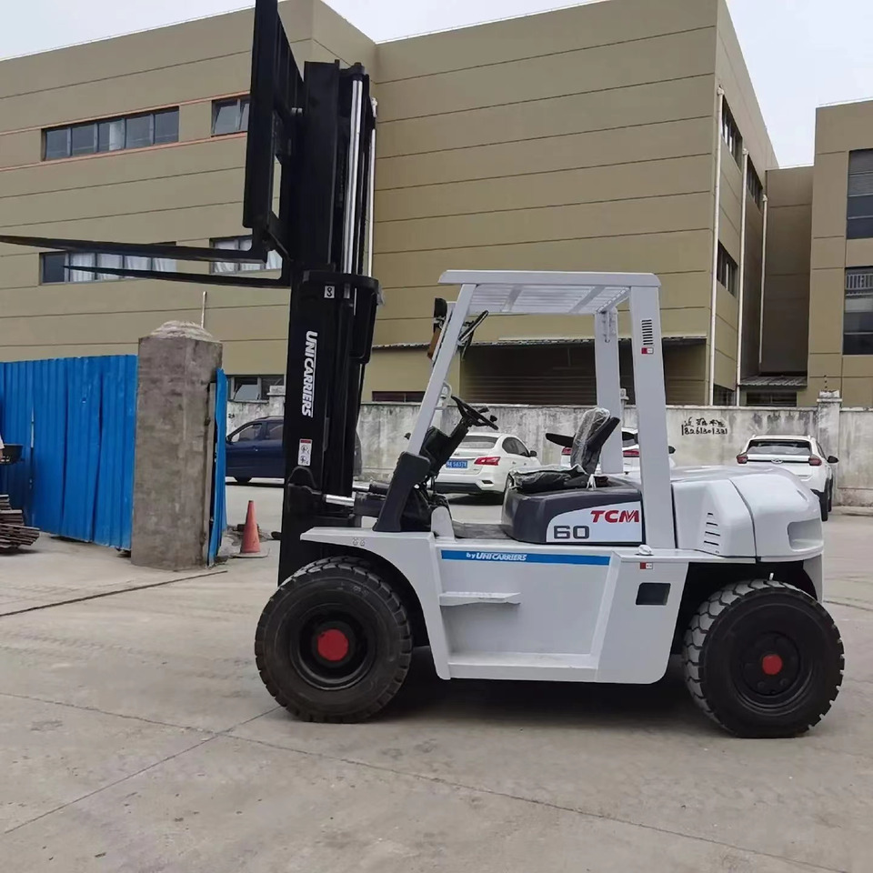 TCM 6 ton Diesel Forklift FD60 with Fork Positioner - Stivuitor diesel: Foto 1 TCM 6 ton Diesel Forklift FD60 with Fork Positioner - Stivuitor diesel: Foto 1
