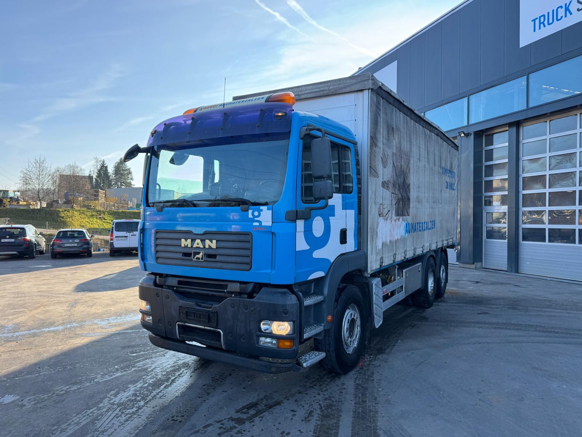 MAN TGA 26.440 6x2 - Camion cu prelată: Foto 1 MAN TGA 26.440 6x2 - Camion cu prelată: Foto 1