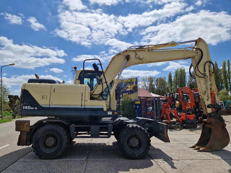 Hyundai Robex 140W-9 met airco - Excavator pe roţi: Foto 2 Hyundai Robex 140W-9 met airco - Excavator pe roţi: Foto 2