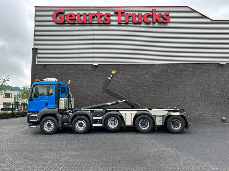 MAN TGS 50.460 10X4-8 BLH MET VDL S-40-7200 HAAKARMSYSTEEM / ABROLLKIPPER / HOOKLIFT - Camion cu cârlig: Foto 1 MAN TGS 50.460 10X4-8 BLH MET VDL S-40-7200 HAAKARMSYSTEEM / ABROLLKIPPER / HOOKLIFT - Camion cu cârlig: Foto 1