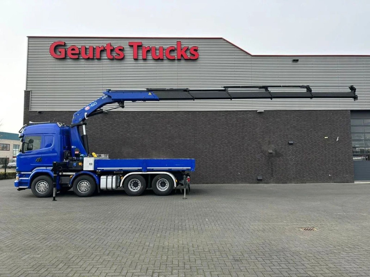 Scania R580 V8 8X4 TREKKER-BAKWAGEN COMBI + HMF 4020-K5 - Camion cu macara: Foto 1 Scania R580 V8 8X4 TREKKER-BAKWAGEN COMBI + HMF 4020-K5 - Camion cu macara: Foto 1