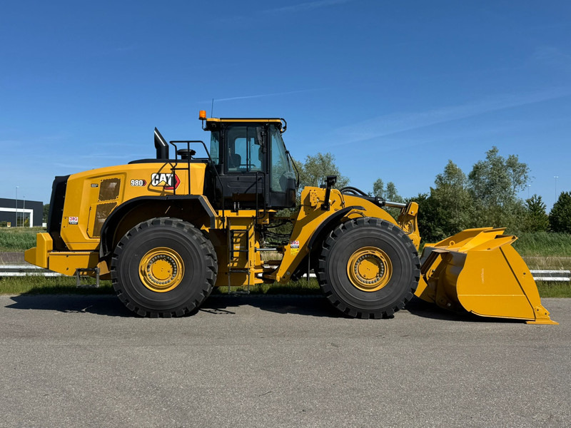 Încărcător frontal pe pneuri Caterpillar 980: Foto 6