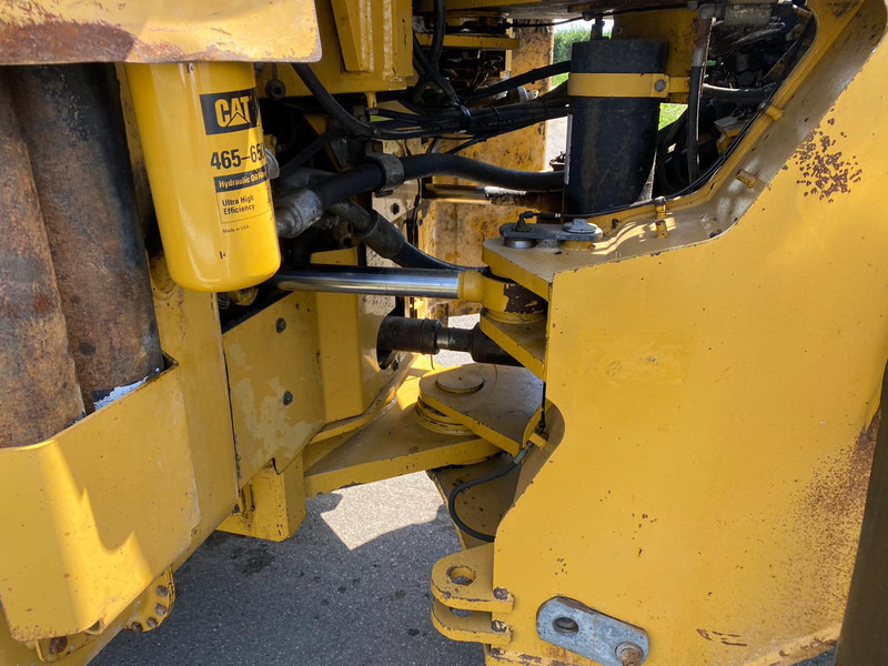 Încărcător frontal pe pneuri Caterpillar 980H: Foto 12