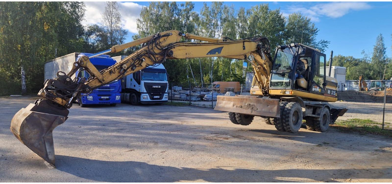 Caterpillar M 315 Rototilt - Excavator pe roţi: Foto 4 Caterpillar M 315 Rototilt - Excavator pe roţi: Foto 4