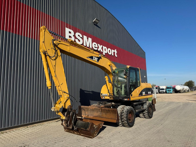 Caterpillar M 316 C - Excavator pe roţi: Foto 1 Caterpillar M 316 C - Excavator pe roţi: Foto 1