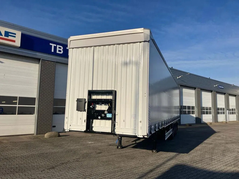 Kässbohrer SCS X / 90 - 12 /27 met hefdak en twee liftassen - Semiremorcă prelată: Foto 3 Kässbohrer SCS X / 90 - 12 /27 met hefdak en twee liftassen - Semiremorcă prelată: Foto 3