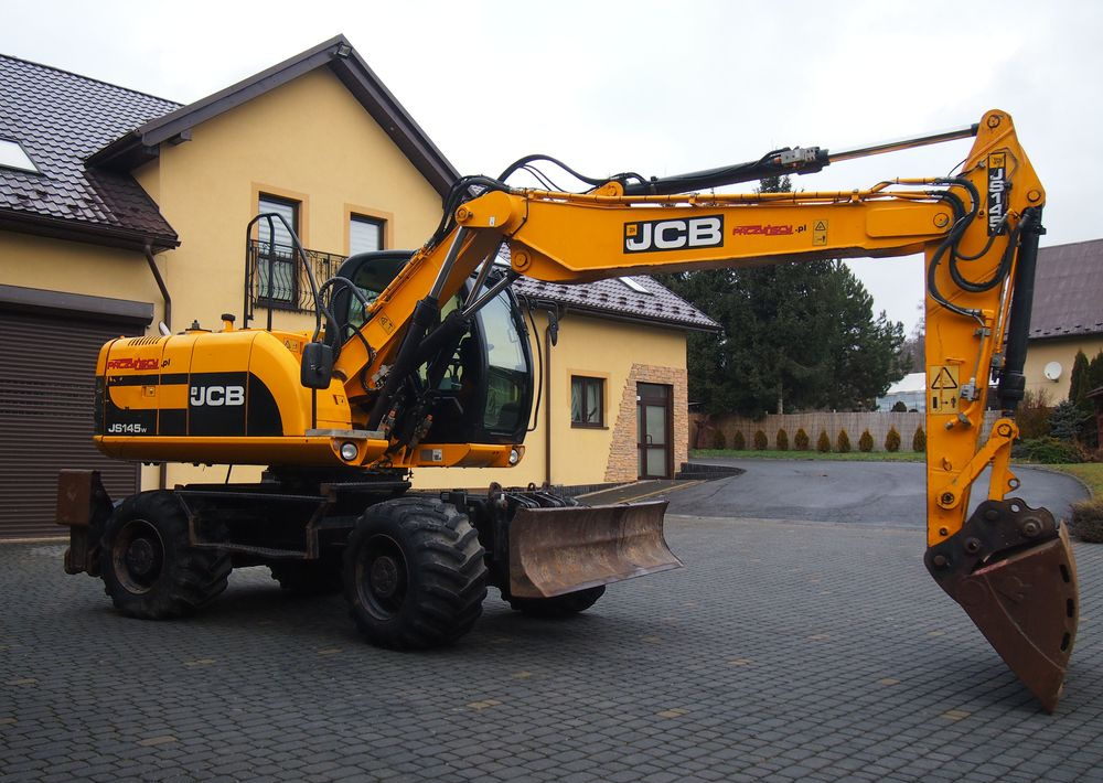 Koparka kołowa JCB JS145W 2011 Koparka JCB - Excavator pe roţi: Foto 1 Koparka kołowa JCB JS145W 2011 Koparka JCB - Excavator pe roţi: Foto 1