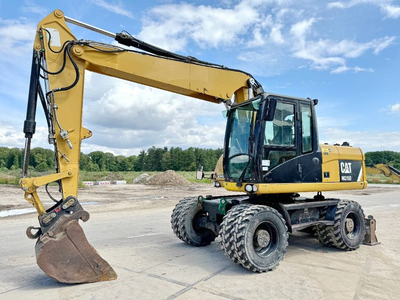 Cat M315D - Triple Boom / Quick Coupler - Excavator pe roţi: Foto 2 Cat M315D - Triple Boom / Quick Coupler - Excavator pe roţi: Foto 2