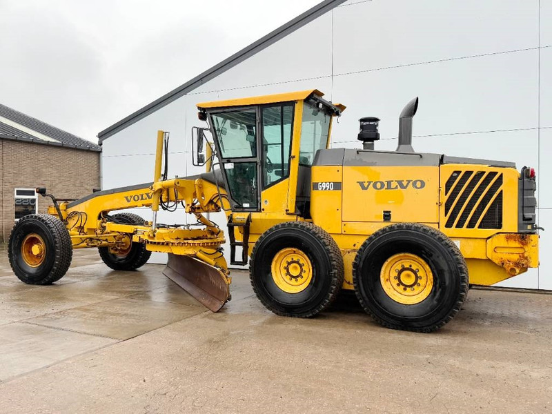 Volvo G990 - 4.85m Blade / Pushblock / Airco - Autogreder: Foto 2 Volvo G990 - 4.85m Blade / Pushblock / Airco - Autogreder: Foto 2