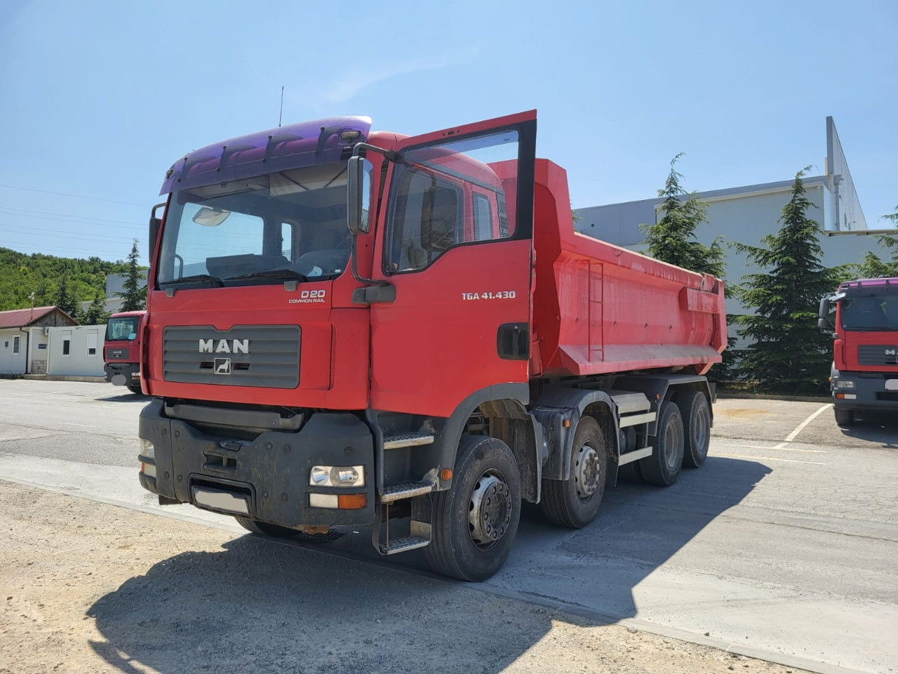 MAN TGA 41.430 8x4 meiller tipper - hydr. back site - Camion basculantă: Foto 1 MAN TGA 41.430 8x4 meiller tipper - hydr. back site - Camion basculantă: Foto 1