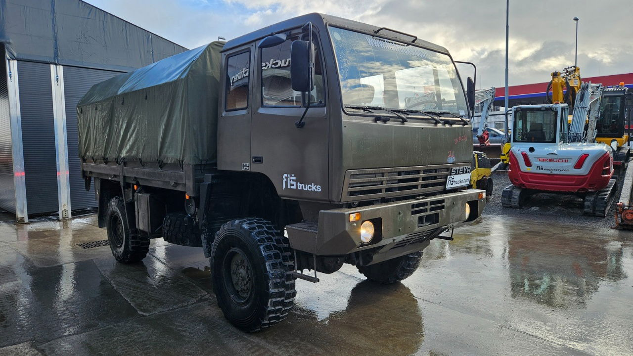 Steyr 12M18 4X4 stake body - truck - Camion cu prelată: Foto 2 Steyr 12M18 4X4 stake body - truck - Camion cu prelată: Foto 2