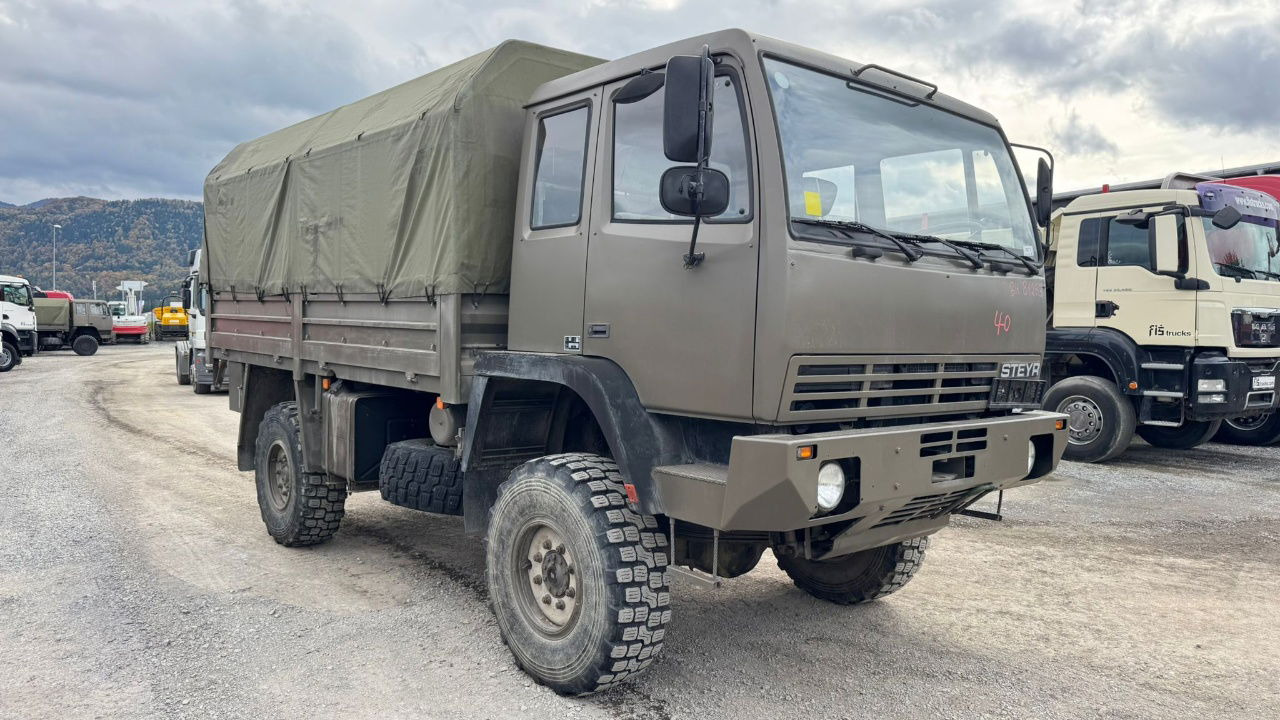 Steyr 12M18 4X4 stake body - truck - Camion cu prelată: Foto 4 Steyr 12M18 4X4 stake body - truck - Camion cu prelată: Foto 4