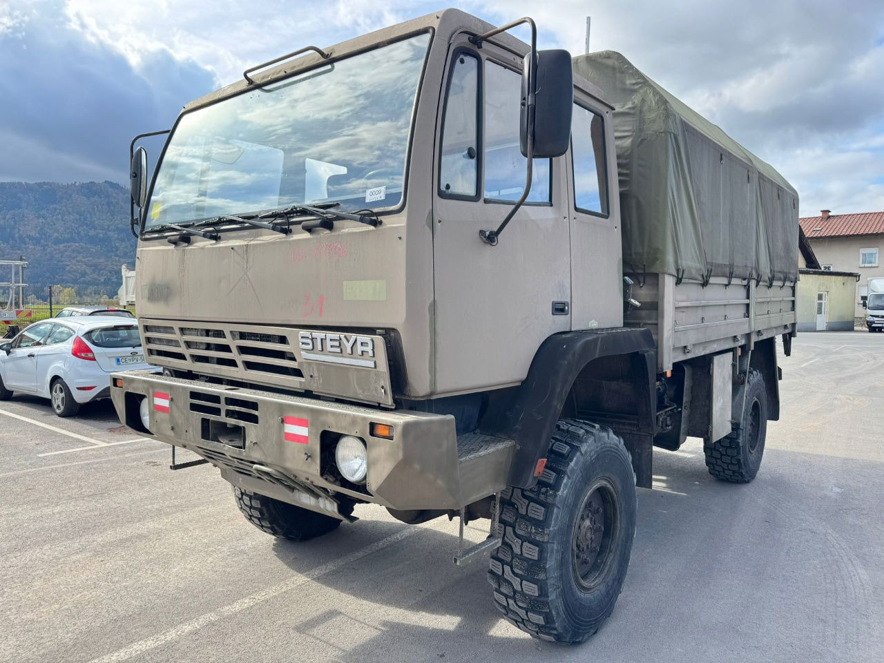 Steyr 12M18 4X4 stake body -  truck - Camion cu prelată: Foto 1 Steyr 12M18 4X4 stake body -  truck - Camion cu prelată: Foto 1
