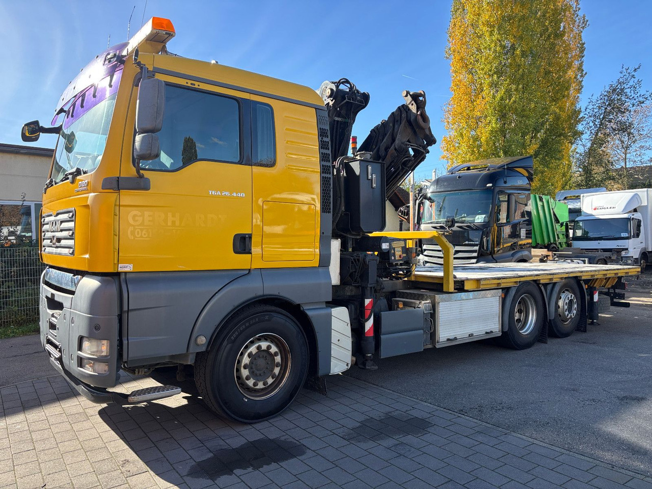 MAN TGA 26.440 FASSI F450AXP Containerauf./Lenkachse - Camion cu macara: Foto 1 MAN TGA 26.440 FASSI F450AXP Containerauf./Lenkachse - Camion cu macara: Foto 1