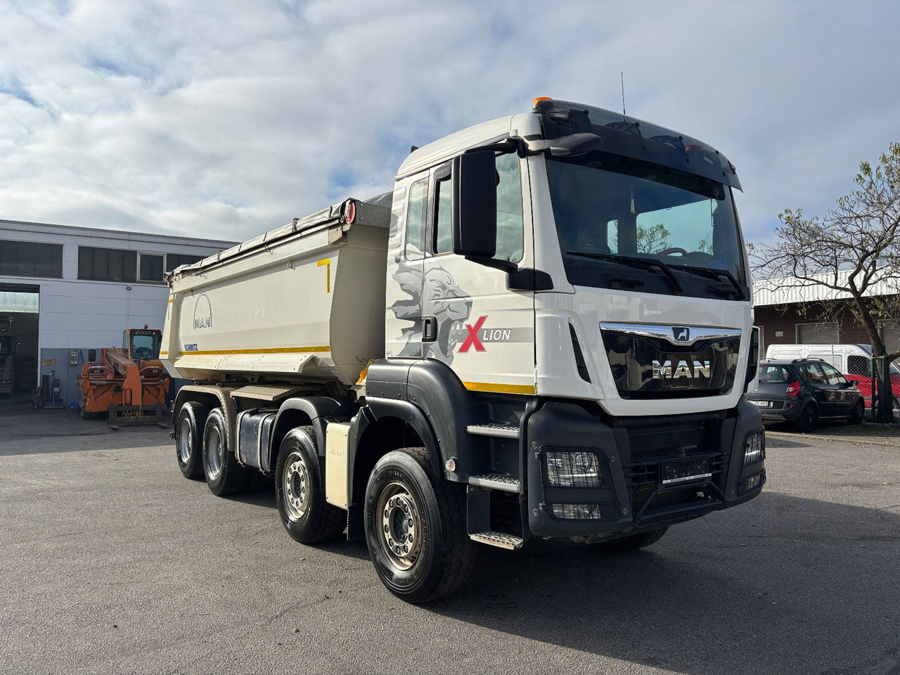 MAN TGS41.510 8x4 Schmitz Muldenkipper Retarder/19m³ - Camion basculantă: Foto 2 MAN TGS41.510 8x4 Schmitz Muldenkipper Retarder/19m³ - Camion basculantă: Foto 2