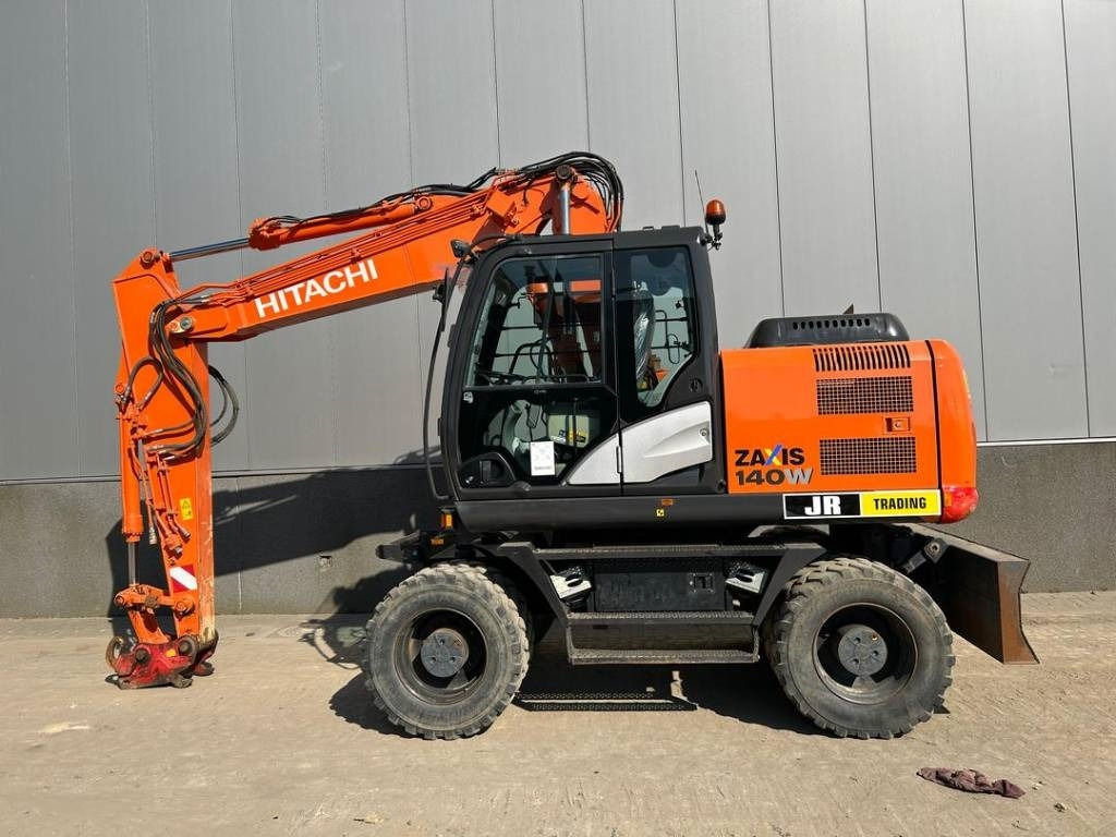 Hitachi ZX 140 W-5B - Excavator pe roţi: Foto 1 Hitachi ZX 140 W-5B - Excavator pe roţi: Foto 1