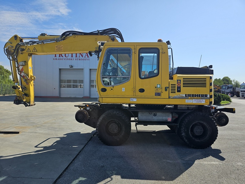 LIEBHERR A900C ZW - Excavator pe roţi: Foto 1 LIEBHERR A900C ZW - Excavator pe roţi: Foto 1
