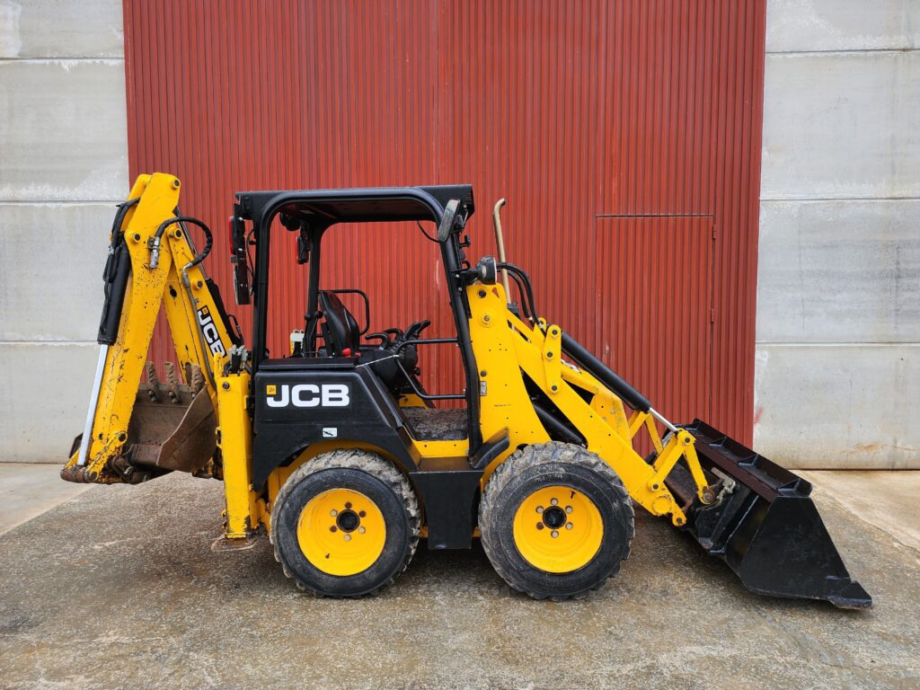 JCB 1CX - Buldoexcavator: Foto 1 JCB 1CX - Buldoexcavator: Foto 1