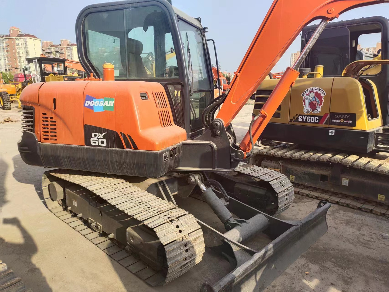 DOOSAN DX60 - Mini excavator: Foto 1 DOOSAN DX60 - Mini excavator: Foto 1