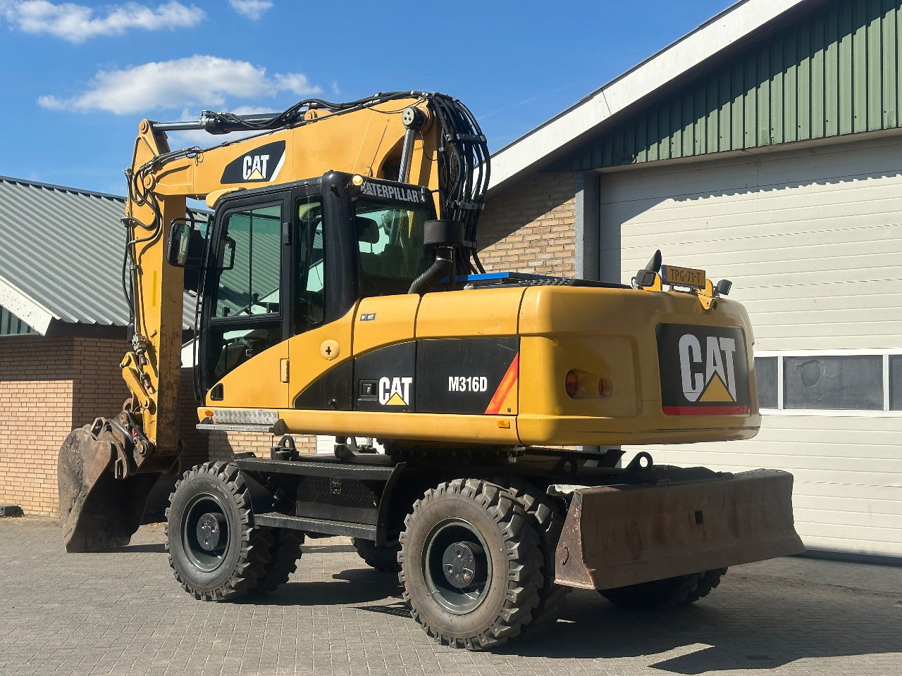 Caterpillar M316D - Încărcător frontal pe pneuri: Foto 3 Caterpillar M316D - Încărcător frontal pe pneuri: Foto 3